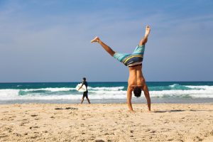 How can I improve my chances of falling pregnant - Man enjoying time on beach